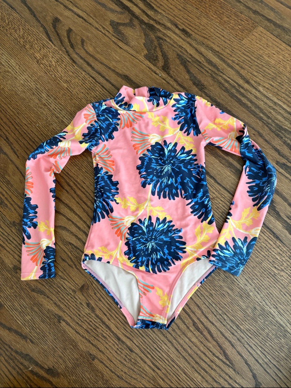 Mott50 Kids Long Sleeve Coral Pink Rashguard One-Piece with Navy Floral